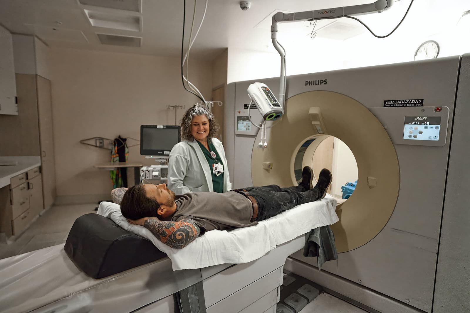 A patient enters an imaging machine