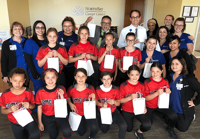 Members of the Game Day 10-and-under softball team donated goodie bags for patients at the Northbay Cancer Center in March.