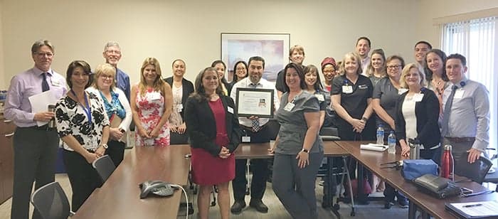 A team of employees celebrate the Gold Plus Quality Achievement Award for the Northbay Stroke Program.
