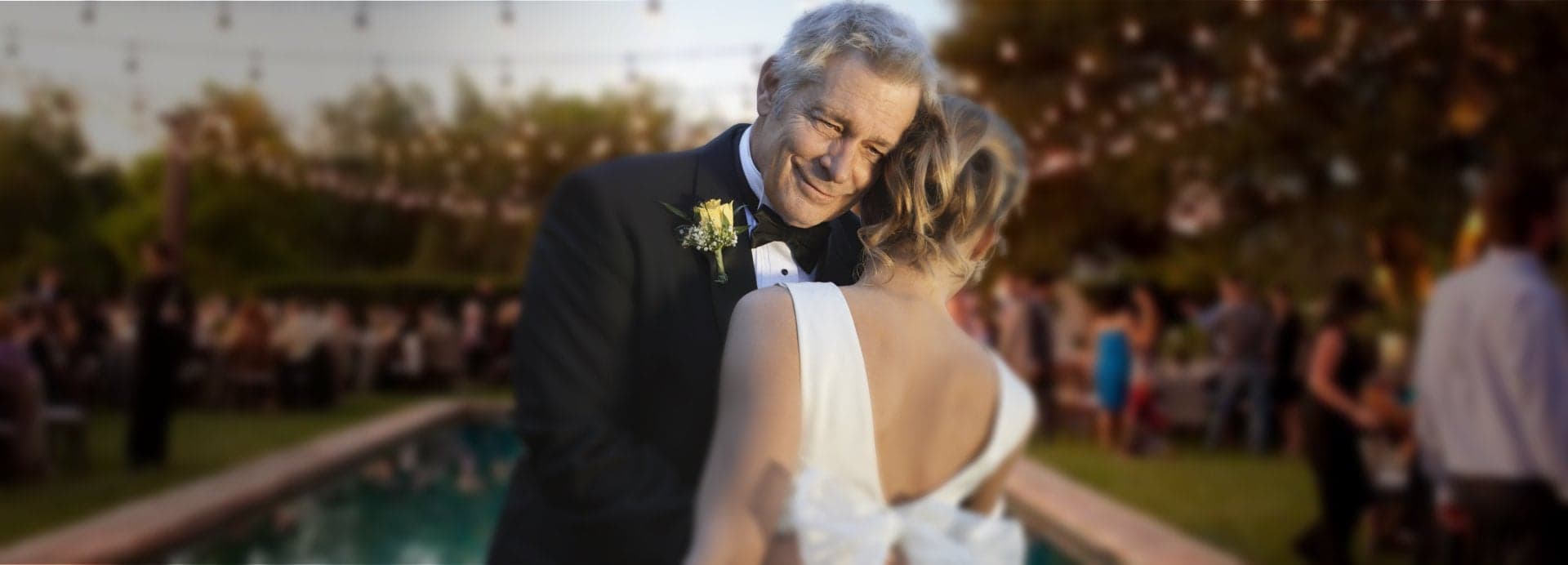 A man dancing with his daughter