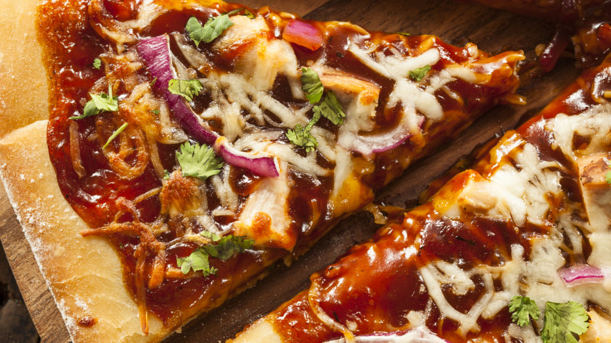 Up-close shot of a BBQ pizza.