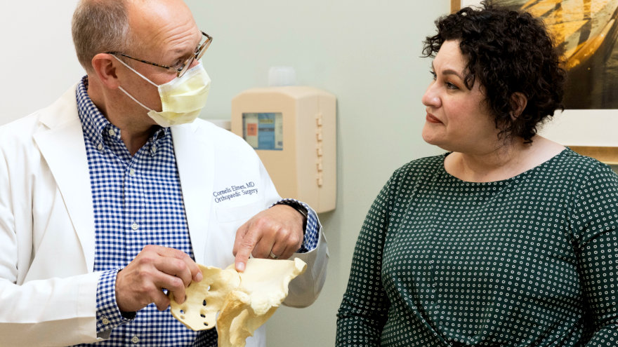 NorthBay orthopedic specialist Dr. Cornelis Elmes, M.D. (left) and Maria Murillo (right) conversing together.