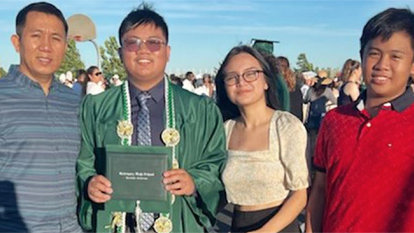 Patient Paul Palma and his family at his high school graduation.