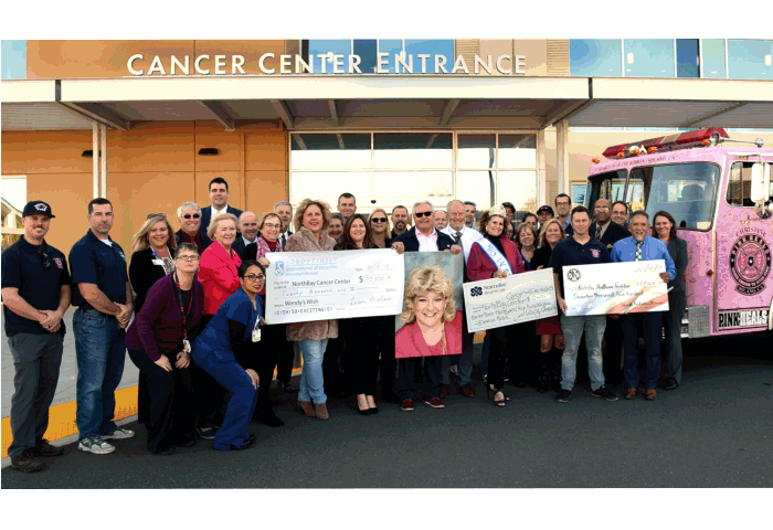 The season of sharing has special meaning for the NorthBay Cancer Center this week, after firefighters, a Vacaville service organization and a generous individual donor came together on Monday to present checks totaling $54,800 in donations.