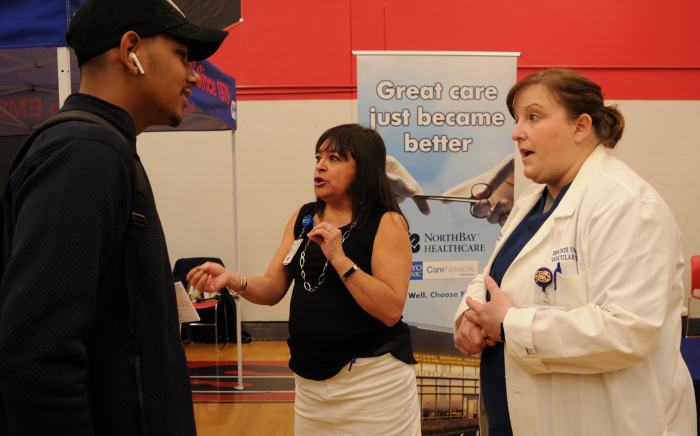 NorthBay Healthcare Nurse Practitioner Laura Andrews (above left) and vascular surgeon Brandi Upton, M.D., answer questions from students during a career day event at Fairfield High School.
